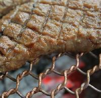 黄土釜と炭で2度焼きした豚カルビ