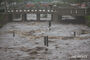 大雨で清渓川が氾濫　／ソウル